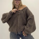 maglione con apertura regolabile sul davanti laccio